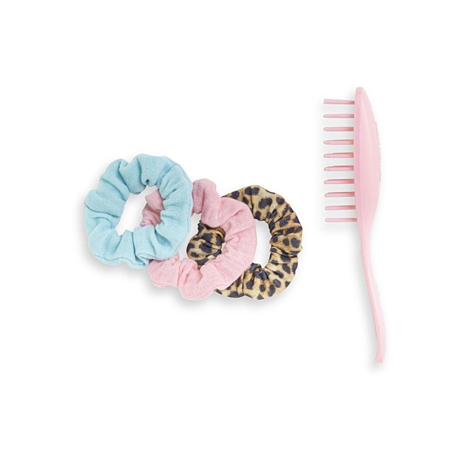 Set spazzola ed elastici per capelli...